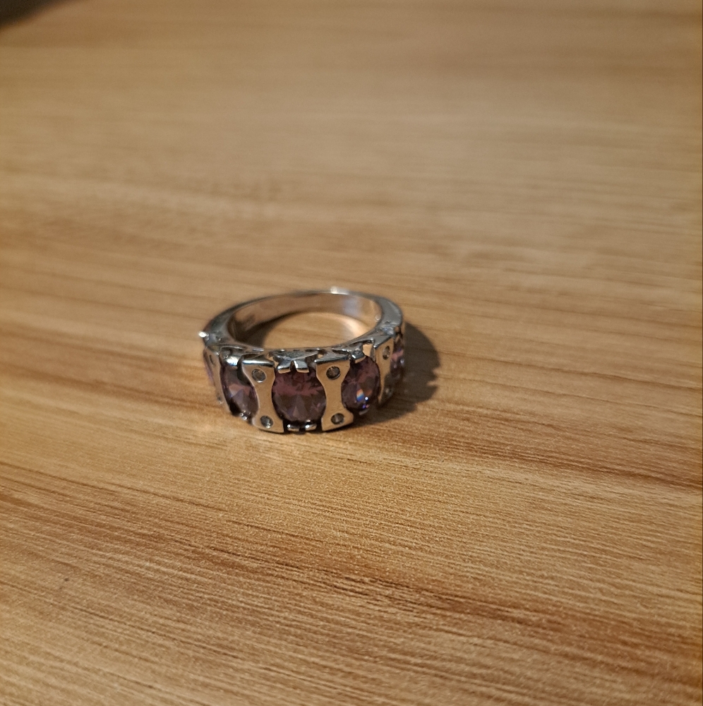 Stainless steel ring size 9 with purple precious rocks